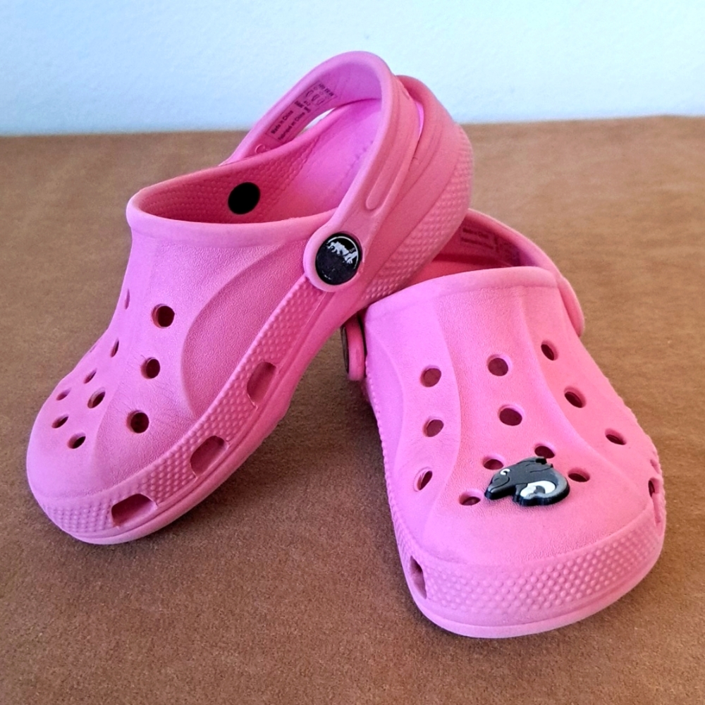Crocs pink shoes size 10 shall charm included.